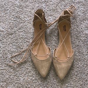 Beige lace up flats with gold accents